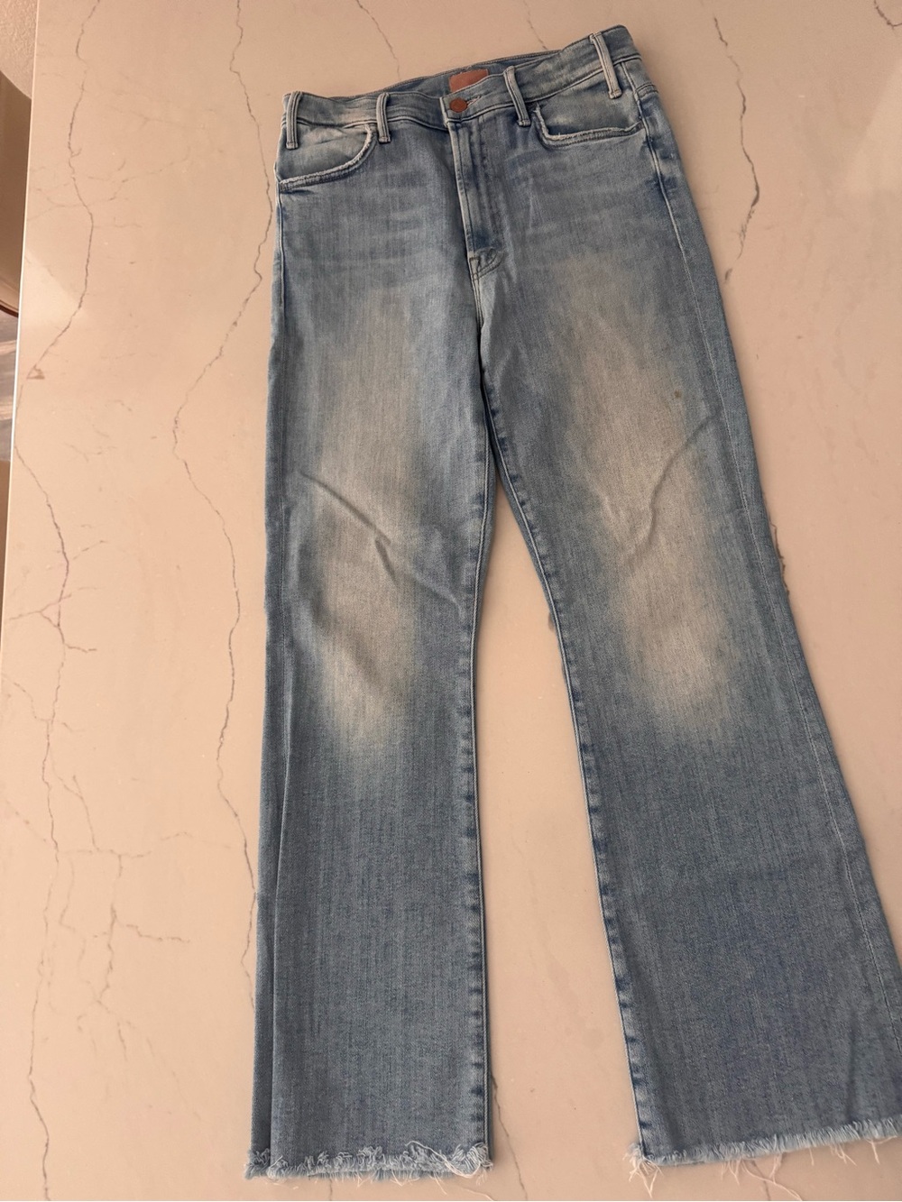 MOTHER light blue denim jeans with tan leather logo patch